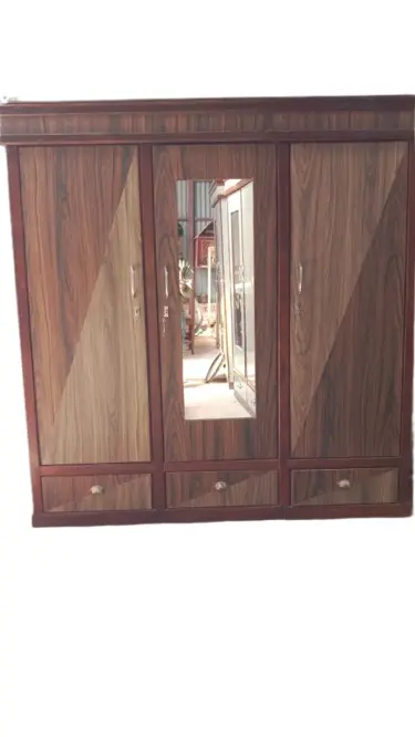 Three-door wooden wardrobe with mirror and drawers